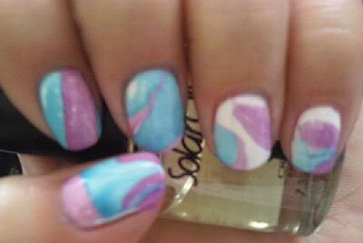 hm i've always liked water marble nails, you could do that with pastel