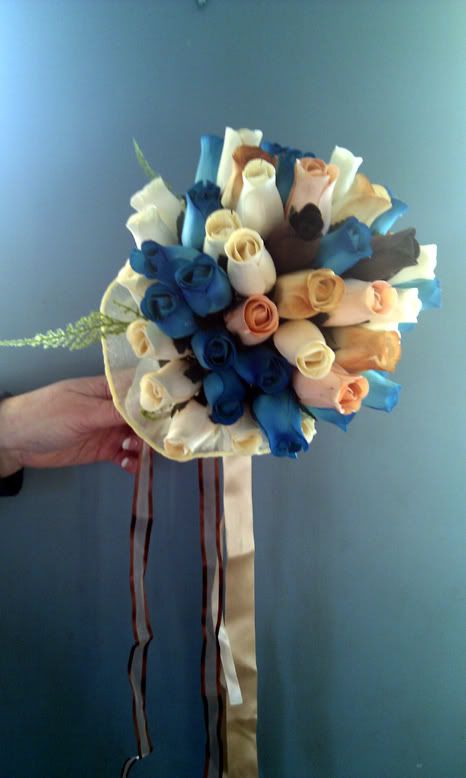 Her bouquet it still needs a teal ribbon and some bling 