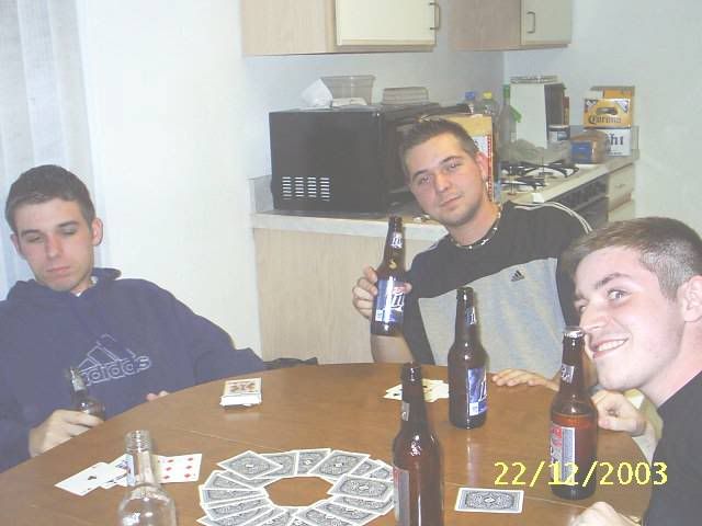 [http://img.photobucket.com/albums/v17/BoricuaDelight/rick_dan_chris_playing_drinking_game.jpg]