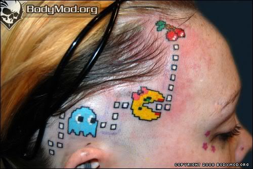 The Pac Man utt tattoo.