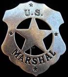 wyatt-earp-marshal-badge.jpg