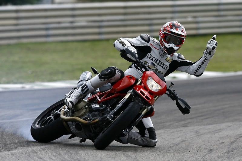 http://img.photobucket.com/albums/v191/tobereeno/2008-Ducati-Hypermotard1100Se.jpg