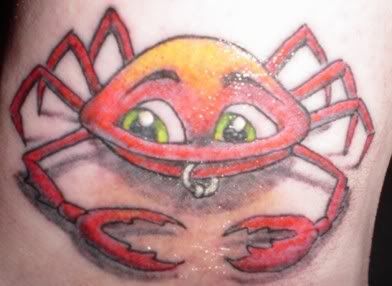 sexy piercing crab tattoo