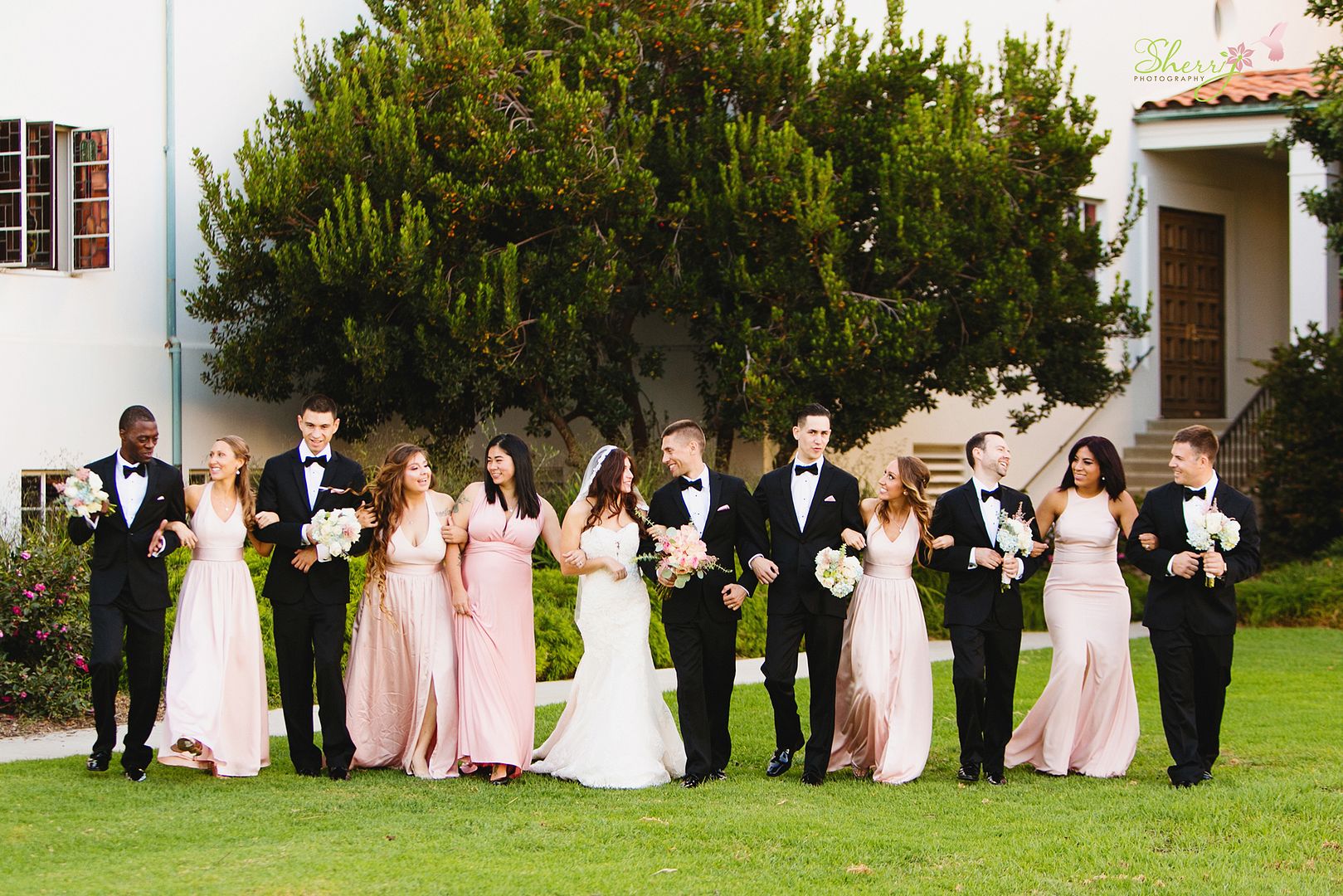 blush and tuxedo wedding attire