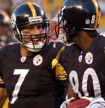 Pittsburgh Steelers quarterback Ben Roethlisberger (7) celebrates the first of two first quarter touchdown passes with receiver Plaxico Burress (80) against the New England Patriots Sunday, Oct. 31, 2004 in Pittsburgh.(AP Photo/Gene J. Puskar