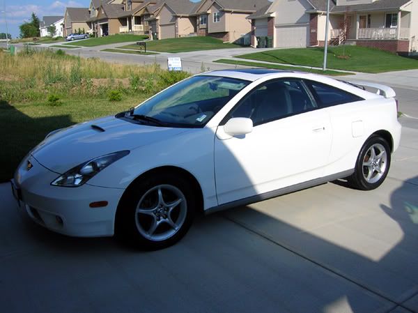 I drive a white 2000 Toyota Celica: And, I love it to death.