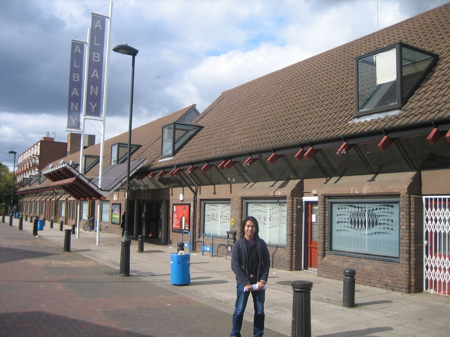 Siege Malvar stands by his lonesome outside The Albany. You couldnt tell it from this photo, but he just had some amazing curry from the Indian restaurant down the road. Or could you?