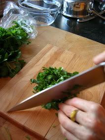 Elise chops parsley