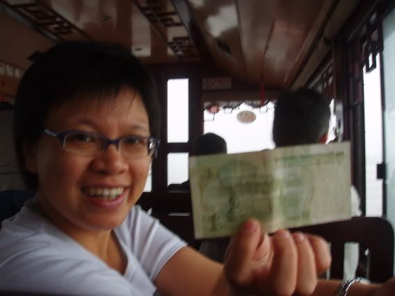 My Lecturer Joolay holding a 1 Yuan note