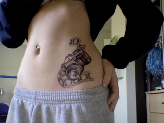 camera tattoo. I have a tattoo of one of my