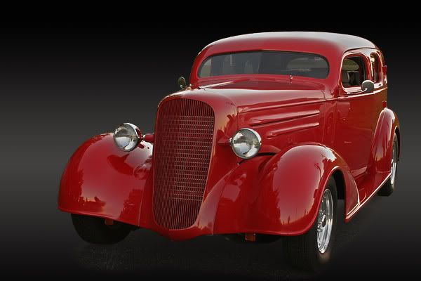 IMAGE: http://img.photobucket.com/albums/v218/PhotosGuy/Car%20Stuff/36-Chevy-Standard_FrtQtr_04.jpg