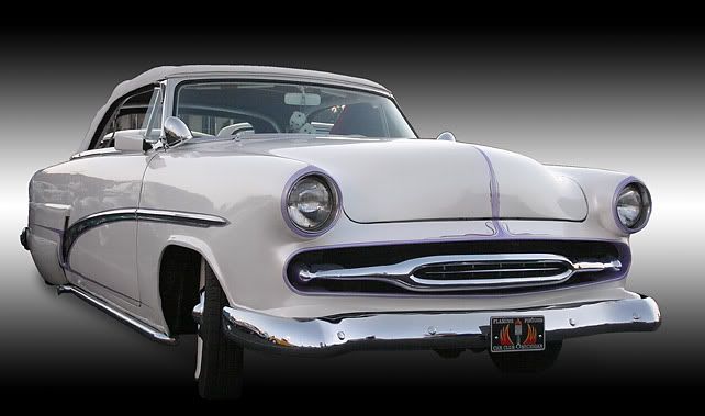 IMAGE: http://img.photobucket.com/albums/v218/PhotosGuy/Forum%20Junk/53-Ford_Sunliner_Front_07.jpg