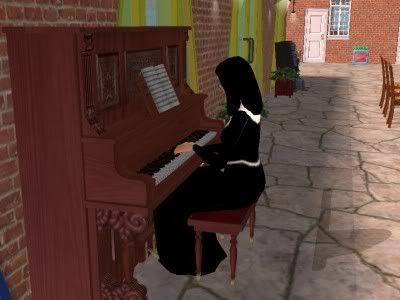 121_Kamara_plays_piano.jpg