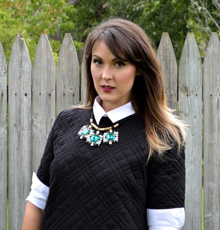  photo black dress and statement necklace.jpg