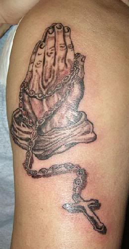 religious-tattoo-11549095077109.jpg