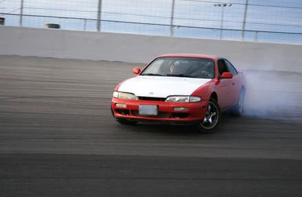 http://img.photobucket.com/albums/v236/renegade141/Nissan240sx/track-with-ami.jpg