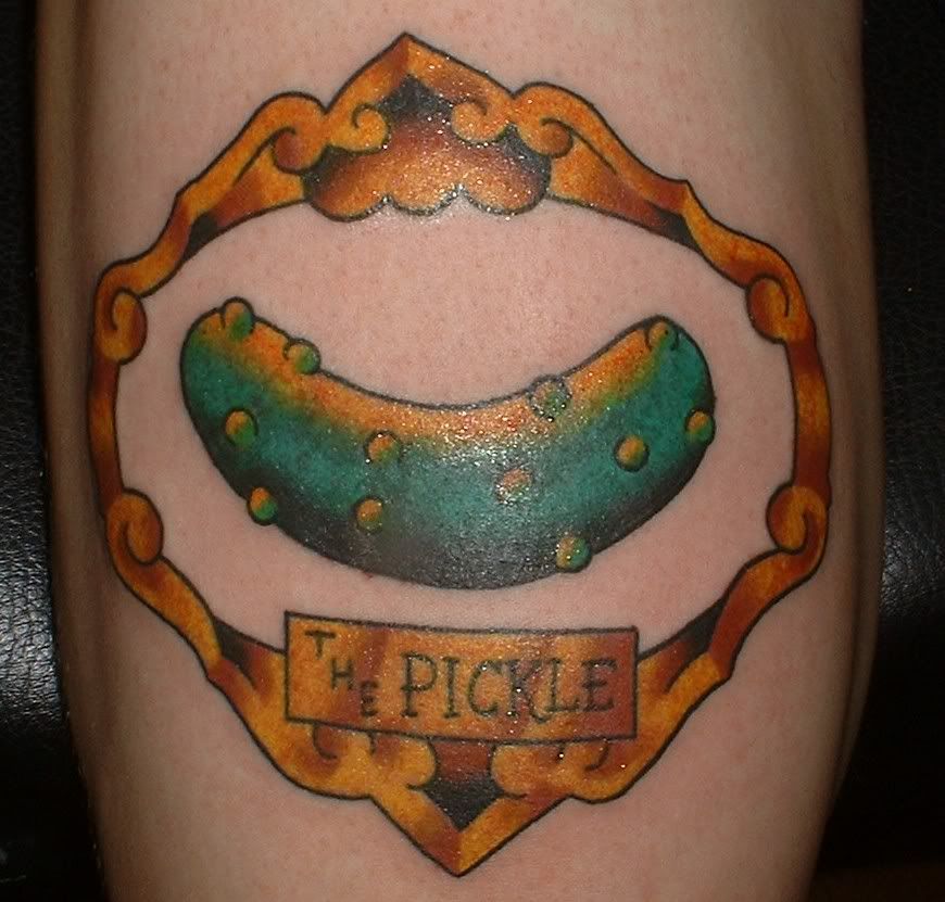 (I'll admit that, while this may not be the worst tattoo ever, it certainly 