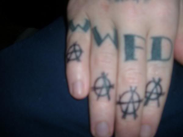 got an anarchy symbol on each knuck. and since my wife left me i had to void 
