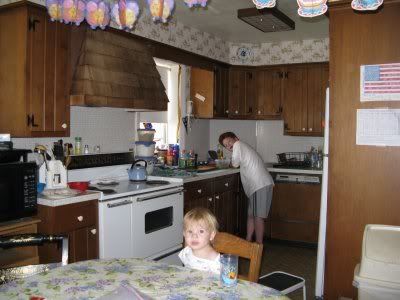 Yes, that is my teenager doing dishes!!!  We train the slaves well here!