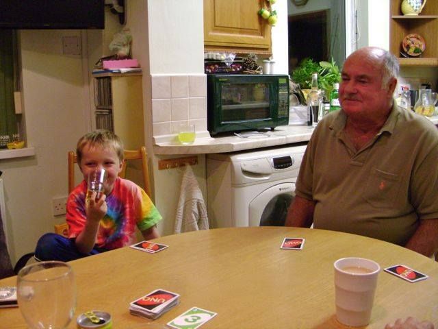 Playing Uno. Because my son has become obsessed with the game. He had so much fun visiting his relatives. photo 10552612_10154435957725023_9128356578732095929_n.jpg
