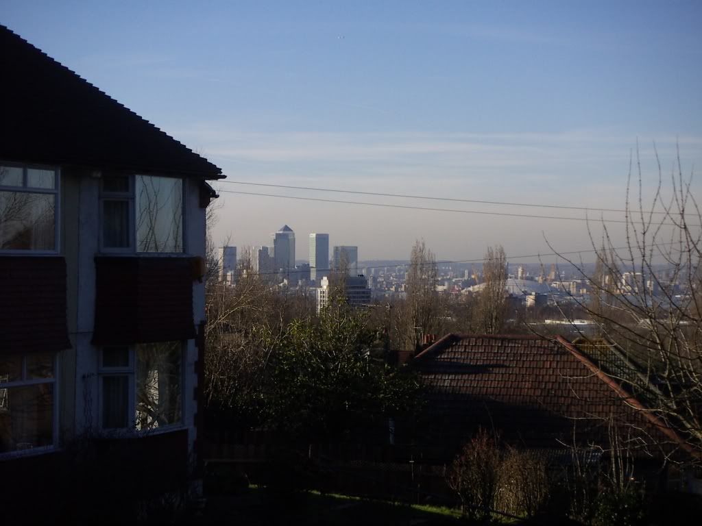 Canary Wharf on the left, Millennium Dome in the middlecalled the O2 Arena now.  