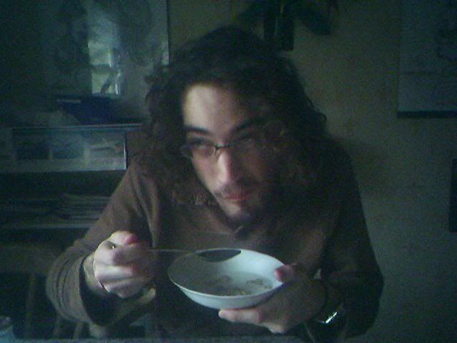 Mmm, thats good cereal...he still wanted my toast more though. BWA-HA-HA-HA!!
