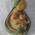 "Birth Partner" pendant: <br> Aqua on Amber