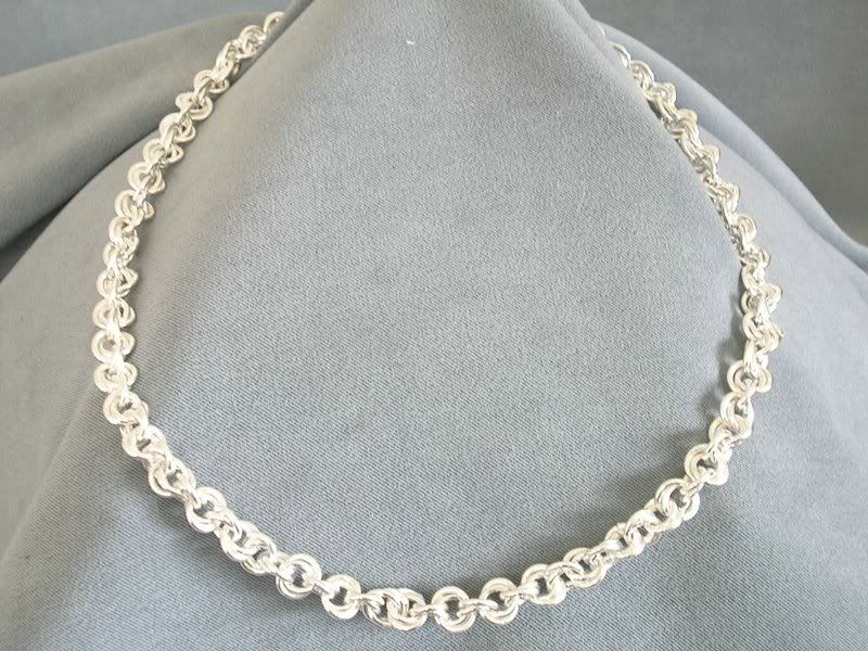  chain, yet still a substantial and impressive handcrafted 18K Gold chain 