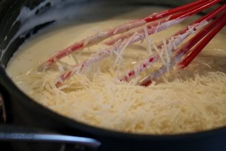 Adding cheese to the bechamel