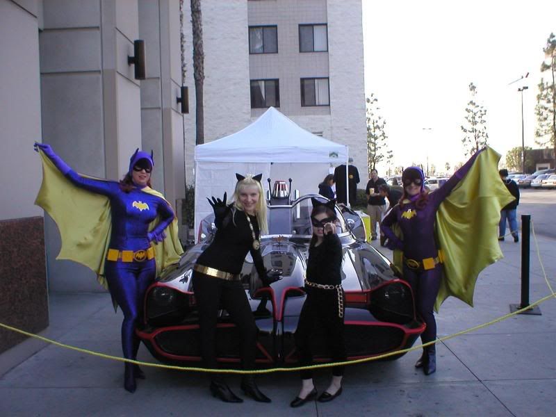 2Batgirlsand2Catwomenatthebatmobile.jpg