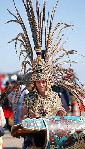 Roberto E. Rosales/Journal<br />Aztec dancer Jorge Garcia is a member of a group that took part in the 