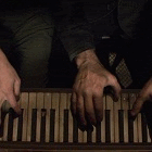 starbuck-tickles-the-ivories.gif