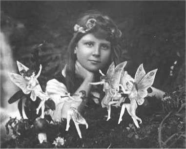 The first of the five photographs, taken by Elsie Wright in 1917, shows Frances Griffiths with the alleged fairies