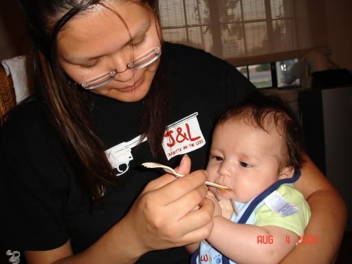 Mommy gets a turn at the peas.