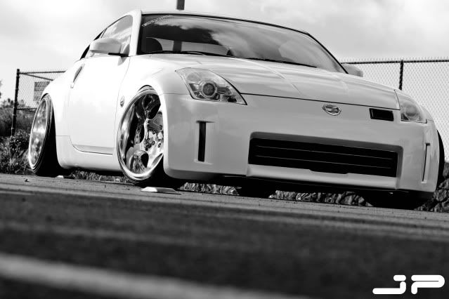 IMAGE: http://img.photobucket.com/albums/v283/AXFREAK/Jokers%20350Z/Jokers350Z3.jpg