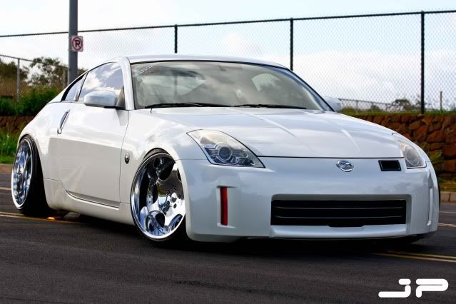 IMAGE: http://img.photobucket.com/albums/v283/AXFREAK/Jokers%20350Z/Jokers350Z9.jpg