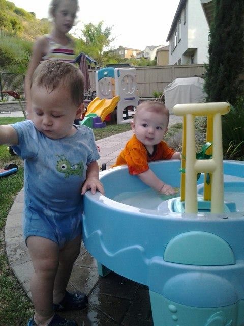 Splashing with cousin Roy