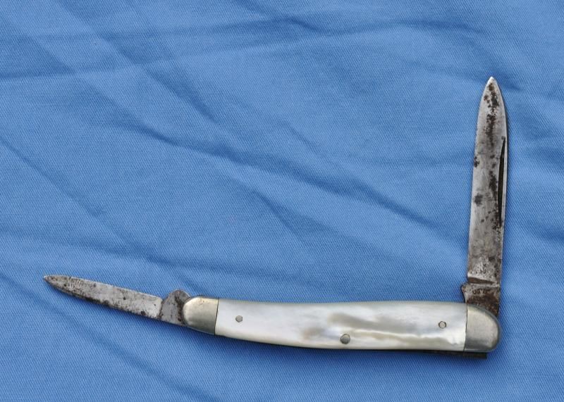 Two blade opposite end knives