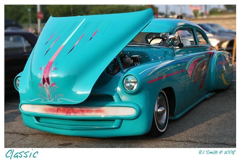 IMAGE: http://img.photobucket.com/albums/v287/BowlXLuk/Canon%20Images/Car%20Show/ClassicCarTurquoise.jpg