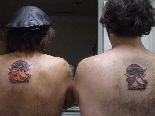 http://img.photobucket.com/albums/v288/stevetheq/FATHERSONTATTOOS005.jpg