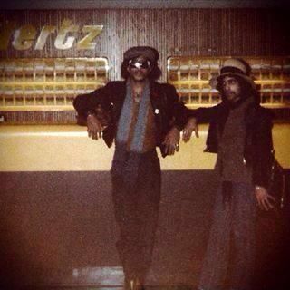 Prince and André waiting for a rental car - 1979