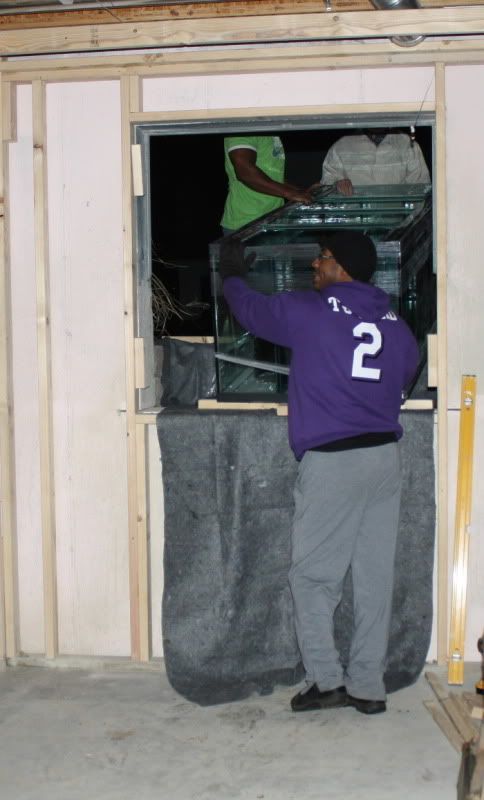This opening was designed speficially for the tank to go into the basement. Without this window the tank would not go into the basement.