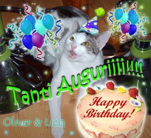 http://img.photobucket.com/albums/v309/urmaniac13/TantiAuguri-cake-1.jpg