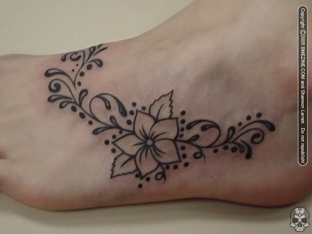 tatuajes pie. Tatuaje en el pie de flores y tribales bmegl091067.jpg image by buli_clint