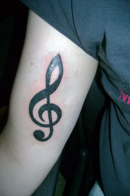 wendy van dijk tattoo. TrebleTattoo.jpg Treble Clef Tattoo right bicep!