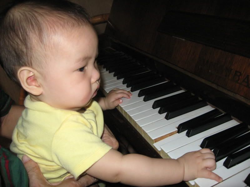 Isaac at the piano