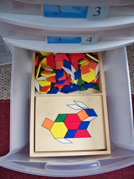 Box 5 a tanagram type activity. he has only 5 boxes but I think that is enough to make him feel like he is doing lessons and such like the bigger kids!