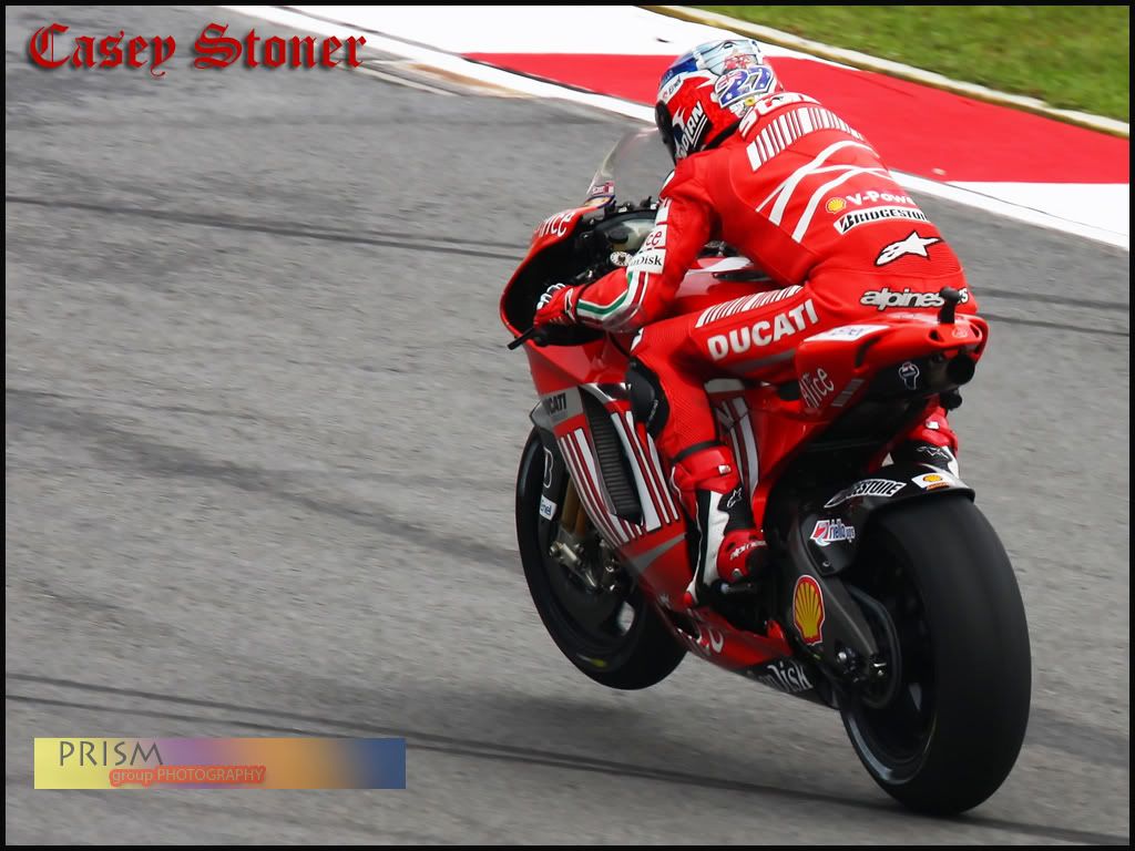 IMAGE: http://img.photobucket.com/albums/v337/bip916/motogp2008/Stoner4.jpg