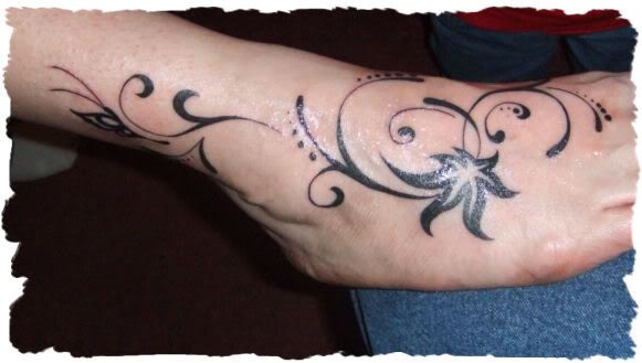 tattoos on side of foot. my ack