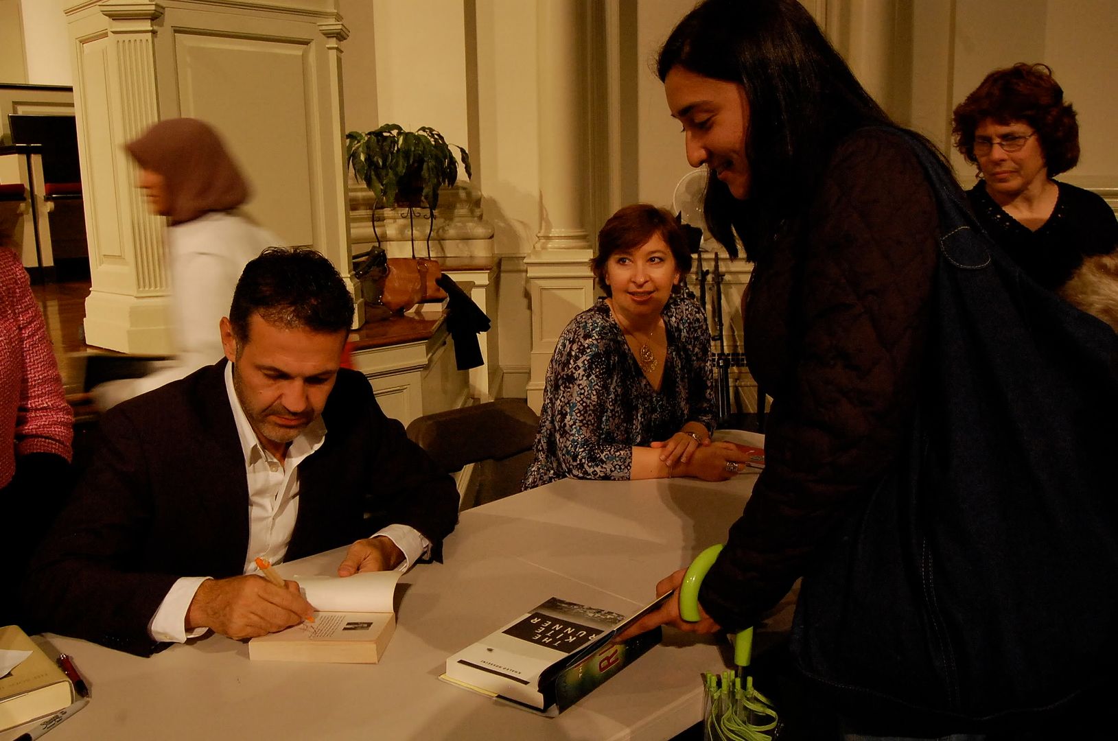 Khaled Hosseini signing autographs after the lecture.